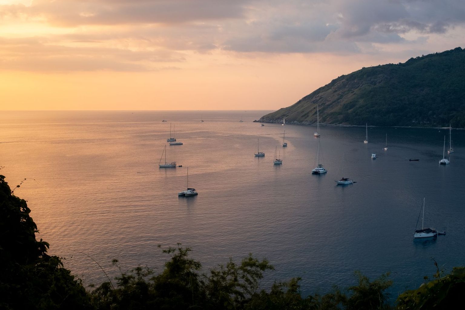 Yachts at anchor off Phuket at sunset
