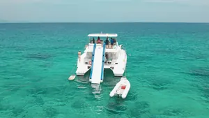 Leopard 51 Se La Vie — stern with the slide and tender Leopard 51 Se La Vie — stern with the slide and tender