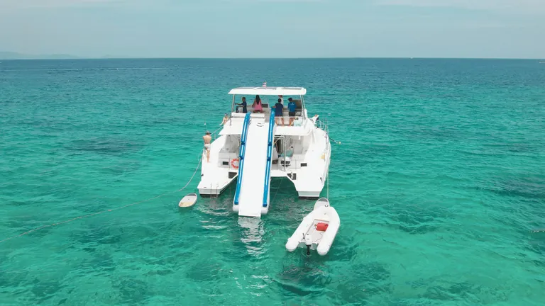 Leopard 51 Se La Vie — stern with the slide and tender Leopard 51 Se La Vie — stern with the slide and tender