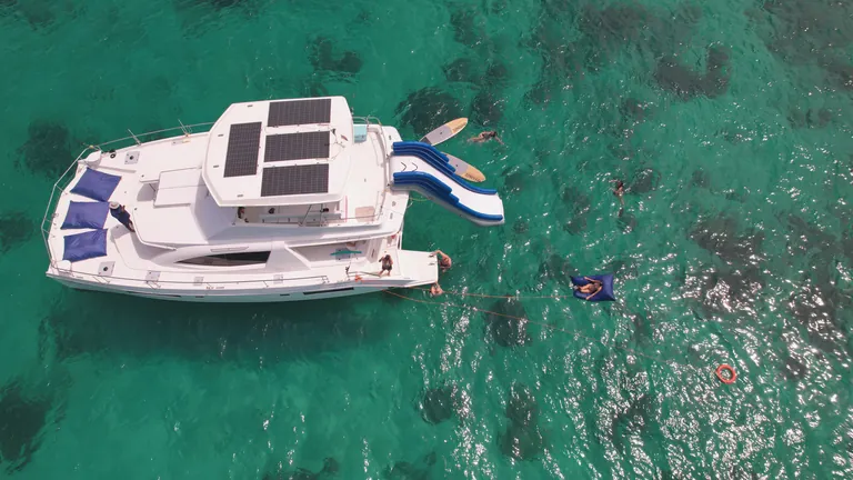 Leopard 51 Se La Vie — top view with snorkellers Leopard 51 Se La Vie — top view with snorkellers